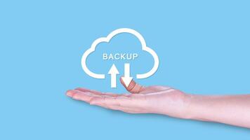 Backup files and data on internet with cloud storage technology that sync all online devices and computers with network connection, protection against loss, touch screen back up icon concep photo