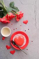red heart cake and an espresso in small cup for valentines day , copy space photo