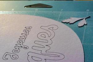 Paper cutting, ornament, design and model cut with a cutting plotter for professional activity or leisure, card photo