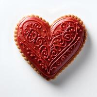 red sugar cookie shaped like a heart isolated on a plain white background with a subtle shadow ideal for creating visuals for Valentines Day or romantic culinary themes photo
