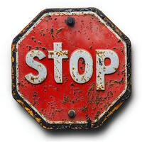 old rustic stop sign isolated on a white background with a subtle shadow showcasing its weathered metal surface and vintage design perfect for traffic safety or retro-themed visuals photo