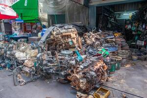 Mechanical workshop in Bangkok with old engines and parts photo