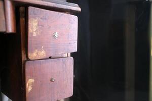Two wooden box drawers, part of a traditional sewing machine compartment with negative space photo