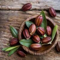 Jojoba seeds in the bowl, healthy food photo, eco photo