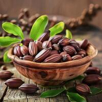 Jojoba seeds in the bowl, healthy food photo