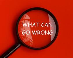 What can go wrong on big magnifying glass. Fact finding concept photo