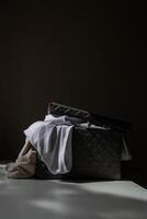 Box with underwear and bed linen photo