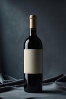 Red Wine Bottle With Blank Label On Dark Background photo