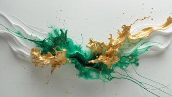 Abstract green and gold fluid art design with vibrant color blending and splatter effects on a white canvas. photo