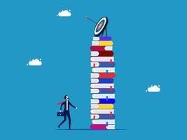 man looking on top of books with target on top vector