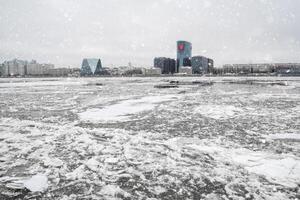 Spring ice drift on the river. Ice on the Neva river in St. Pete photo