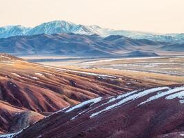 Minimalist nature background of snowy mountainside photo