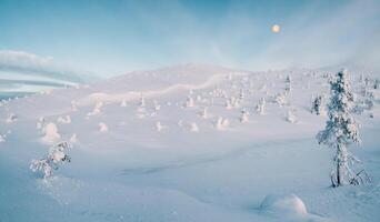 Panoramic view of a winter snow-covered slope with a full moon. Arctic harsh nature. Mystical fairy tale of the winter frost forest. photo