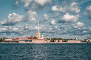 Beautiful autumn view of the Peter and Paul fortress from the Neva river in Saint Petersburg photo