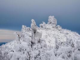 The rocks are covered with ice. photo