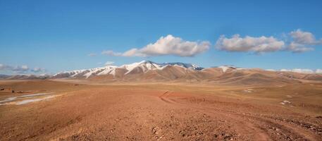 Path through mountains. Trekking mountain trail. photo