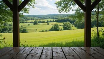 Rustic Wooden Table with Panoramic Countryside View photo
