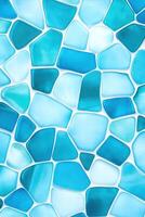 Dynamic geometric mosaic design featuring turquoise, aquamarine, and soft blue tiles arranged in an artistic pattern enhancing modern interiors photo