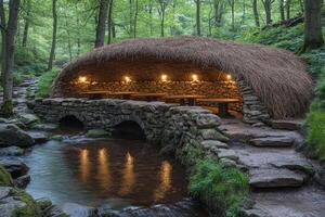 Illuminated Stone Shelter Bridge Over Forest Stream photo