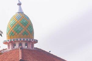 view of the mosque dome with a checkered pattern and bright colors photo
