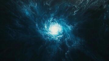 Swirling blue vortex forming in cosmic night sky photo