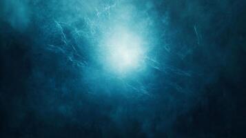 Bright glowing blue abstract cloud in deep space photo