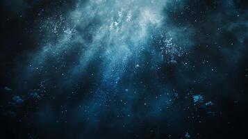 Abstract particles descending through a blue mist layer photo
