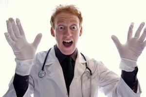 Excited scientist with stethoscope and gloves expressing surprise and enthusiasm photo