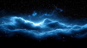 Blue clouds in the night sky with stars photo