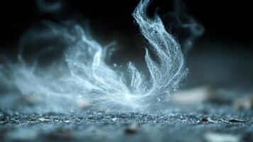 A close up of a feather floating in the air photo