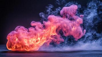 A red and pink smoke ball is shown in the air photo