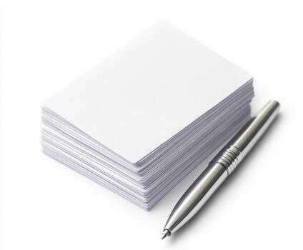 Empty business cards stacked neatly beside a sleek silver pen ready for notes or designs on a clean surface photo