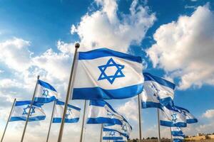 Vibrant display of multiple Israeli flags waving under a bright sky with fluffy clouds photo