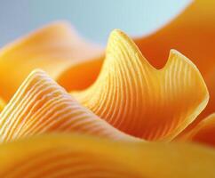 Delicate curves of orange fabric flowing gracefully in soft light, showcasing texture and design photo