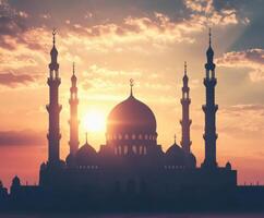 Stunning sunset illuminates mosque silhouette against colorful sky photo