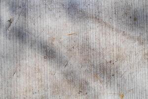 A close up of a piece of paper with some dirt on it photo