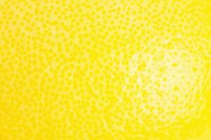 Lemon texture as a background macro photo. photo