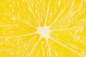 Cut yellow lemon as a background macro photo. Citrus photo