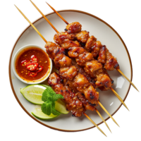 Delicious Grilled Chicken Satay Skewers with Spicy Sauce png