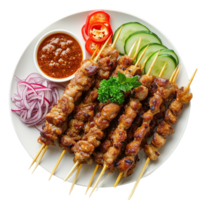 Delicious Chicken Satay Skewers with Peanut Sauce and Fresh Garnishes png