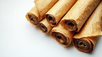 Old parchment rolls display intricate details, inviting exploration of their secrets photo