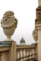 Rooftop view of the New German Cathedral golden adorned Dome in Berlin from the French Church terrace, showing contrast between historical and modern architecture, Foggy cloudy day. Copy space 4 photo
