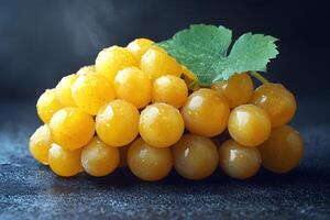 Fresh Yellow Grapes with Dew on Dark Background for Culinary Design and Print photo