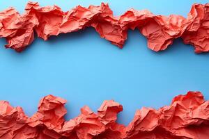 Abstract Composition of Red Crumpled Paper Against Blue Background for Design and Creativity photo