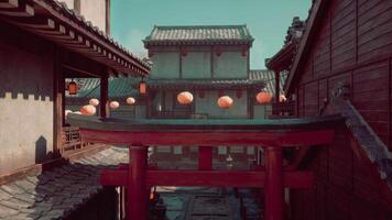 A red gate with lanterns on top of it video