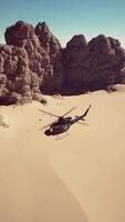 Helicopter Flying Over Desert Rocks video