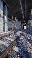 Train Track Passing Through Graffiti-Covered Tunnel video