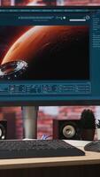 Vertical Computer screen in room with generative artificial intelligence website generating videos using diffusion models. Monitor showing AI virtual assistant producing clips, handheld camera shot