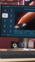 Vertical Computer in apartment office with generative artificial intelligence website generating videos using diffusion models. PC display showing AI virtual assistant producing clips, handheld camera shot