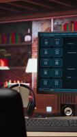 Vertical AI LLM chatbot answering user prompts using predictive technology in home office. Computer setup in apartment workspace using large language model program with artificial intelligence, panning shot video